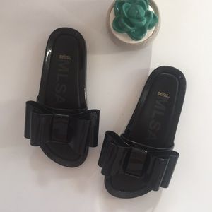 Melissa | big bow slide sandals in black